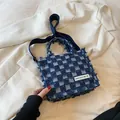 Blue denim checkerboard tote bag with fringe edges and adjustable crossbody strap - Dark Blue
