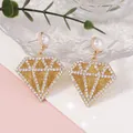 Elegantes pendientes geométricos en forma de rombo con perlas artificiales y strass brillante - Amarillo