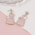 Detail of pink megaphone earrings with crystals and white Cheer letter engraving - Pink