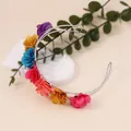 Cerchietto a U con fiori colorati artificiali su una struttura metallica argentata - Argento