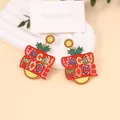 Detail of Vacay Mode beaded strawberry earrings with colorful floral design elements - Vacay Mode Letters (VACAY MODE) / Yellow Orange