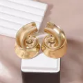 Vintage golden spiral shell stud earrings with textured finish for beach vacations - Matte Gold Spiral Style (Style B)
