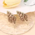 Macro view of gold seashell earrings with sparkling champagne zircon and beaded edges - Gold Conch Inlaid with Rhinestones (Style G)