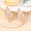 Detailed close-up of vintage shell-shaped earrings with faux pearls and gold alloy base - Gold Shell Inlaid with Pearls (Style H)