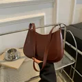 Vintage brown glossy crescent underarm bag with smooth PU leather and slender strap - Dark Brown
