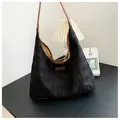 Quilted black canvas tote bag with brown leather straps and large capacity for women - Black