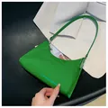 Glossy lime green patent leather underarm bag with elegant V-shaped quilted stitching - Green