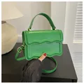 Chic green square bag with wavy edge design and adjustable shoulder strap - Green