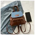 Mini zaino in pelle marrone e denim con chiusura a coulisse e targhetta PAUTOR - Patchwork in Denim / Marrone Scuro