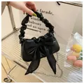 Elegante schwarze PU-Handtasche mit Faltenhenkel und großer Organza-Schleife-Verzierung - Schwarz