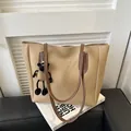 Minimalist large tote bag in khaki PU leather with brown handles and cartoon sheep charm - Khaki With Cartoon Pendant