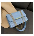 Minimalist light blue square shoulder bag with chevron quilting and golden chain strap - Blue