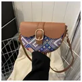 Ethnic style saddle bag featuring brown leather and blue woven pattern accents - Dark Brown