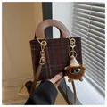 Classic red and green tartan wool handbag with brown leather handles and a cute plush charm - Red with Pendant