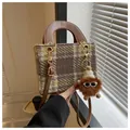 Brown houndstooth wool handbag with leather handle and cute monster plush pendant charm - Coffee With Charms