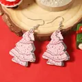 Detail of pink wooden Christmas tree earrings with colorful dots on a wooden stand - Pink Christmas Tree Black Waves (Image 3)
