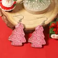 Handcrafted Christmas tree wooden drop earrings with pink festive patterns on display stand - Pink Wood Grain Texture (Image 2)