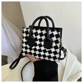 Elegante bolso de mano de pata de gallo blanco y negro con asas y correa de cuero - Negro