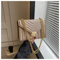Quilted beige shoulder bag with V-shaped stitching and gold chain straps - Khaki