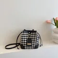 Checkerboard knit bucket bag with black leather trim and elegant gold buckle accent - Without Pendant / Black