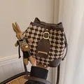 Brown houndstooth knit bucket bag with leather trim and cute rabbit doll keychain charm - With Rabbit Pendant / Coffee