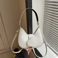 Minimalist white crescent shoulder bag with heart LOVE buckle in smooth leather - White
