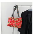 Ethnic style red floral nylon tote bag with wide geometric patterned shoulder strap - Red