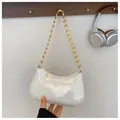 Iridescent white hobo bag with a chunky gold chain strap and glossy finish - White