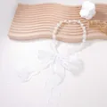 Close-up of elegant white pearl beads and delicate lace bow on a floral necklace - Large Pearl (White)