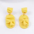 Minimalist yellow geometric petal earrings with textured polymer clay design - Yellow