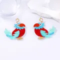 Macro shot of colorful glitter acrylic parrot earrings with elegant pearl stud details - Creative Parrot