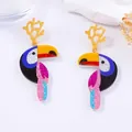 Vibrant multi-layered acrylic toucan earrings with colorful glitter and gold coral hooks - Hornbill