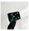 Vintage donkergroene fluwelen crossbodytas met gouden zonnestralen en een ketting - Groen