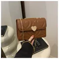 Brown heart quilted crossbody chain bag with a golden heart-shaped metal buckle - Dark Brown
