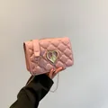 Pink quilted square crossbody bag with gold heart lock and metallic chain strap - Pink