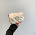 Chic cream white quilted square bag with gold heart lock and elegant chain strap - White