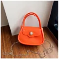 Mini orange jelly bag for kids with gold chain strap and decorative pearl closure - Orange