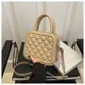 Elegante beige gesteppte Umhängetasche mit Griffen und Rautenmuster-Struktur - Khaki