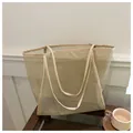 Bolso tote de malla en verde claro y crema para vacaciones de playa y uso diario - Caqui