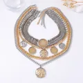 Multi-layered gold and silver chunky chain necklace with textured circular metal pendants - Gold and Silver Two-tone