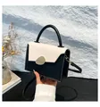 Minimalist black and white contrast leather crossbody bag with gold buckle hardware - White