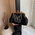 Elegante schwarze Abendtasche mit Perlen-Schmetterling und goldener Ketten-Schulterriemen - Schwarz