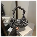Modern navy leopard print pleated handbag with a stylish scrunchie handle design - Black