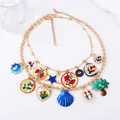 Collier doré multi-rangs avec pendentifs coquillages, étoiles de mer et fleurs - Collier Coquillage Bleu / Bleu