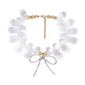 Detailed shot of beaded necklace with frosted waterdrop beads and silver bow pendant - Silver Bowknot