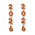 Macro view of gold dangling earrings with orange rhinestones forming 2026 numbers - Orange