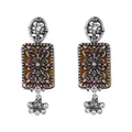 Detailed macro view of vintage geometric floral earrings with amber stones and crystals - Amber Hollow Style / Silver Without Diamonds