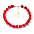 Detail of red cube resin beads with marble texture and gold lobster clasp necklace - Red