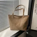 Light khaki tote bag with unique soft faux leather ribcage embossed design and double straps - Khaki