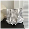 White tote bag with black geometric circular print and long shoulder straps - White